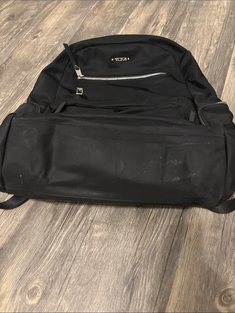 Tumi Black Nylon Backpack with Front Zip Pockets